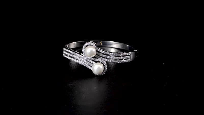 Simulated Pearl and Simulated Diamond Bypass Bangle Bracelet in Silvertone (7.0 In) 0.80 ctw