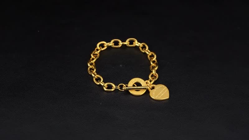 24K Yellow Gold Electroform Curb Chain Bracelet with Heart Charm (6.50 In) 8.25 Grams