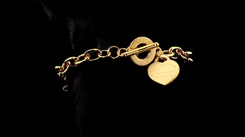 24K Yellow Gold Electroform Curb Chain Bracelet with Heart Charm (7.25 In) 8.90 Grams