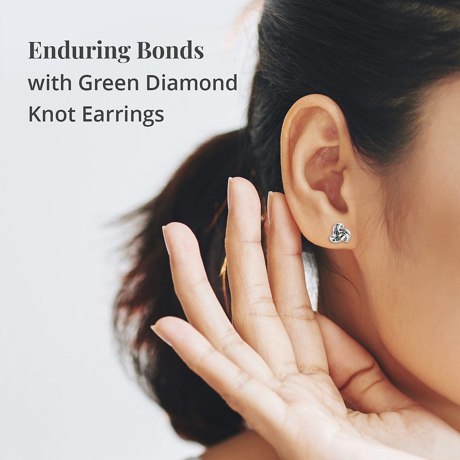 Diamond Knot Stud Earrings in Platinum Over Sterling Silver 0.25 ctw