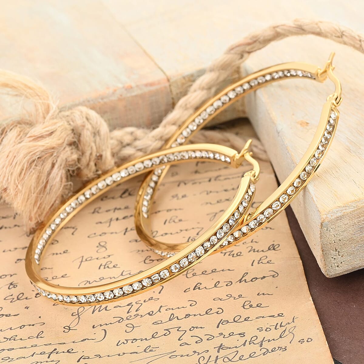 Austrian Crystal Earrings in ION Plated Yellow Gold Stainless Steel image number 1