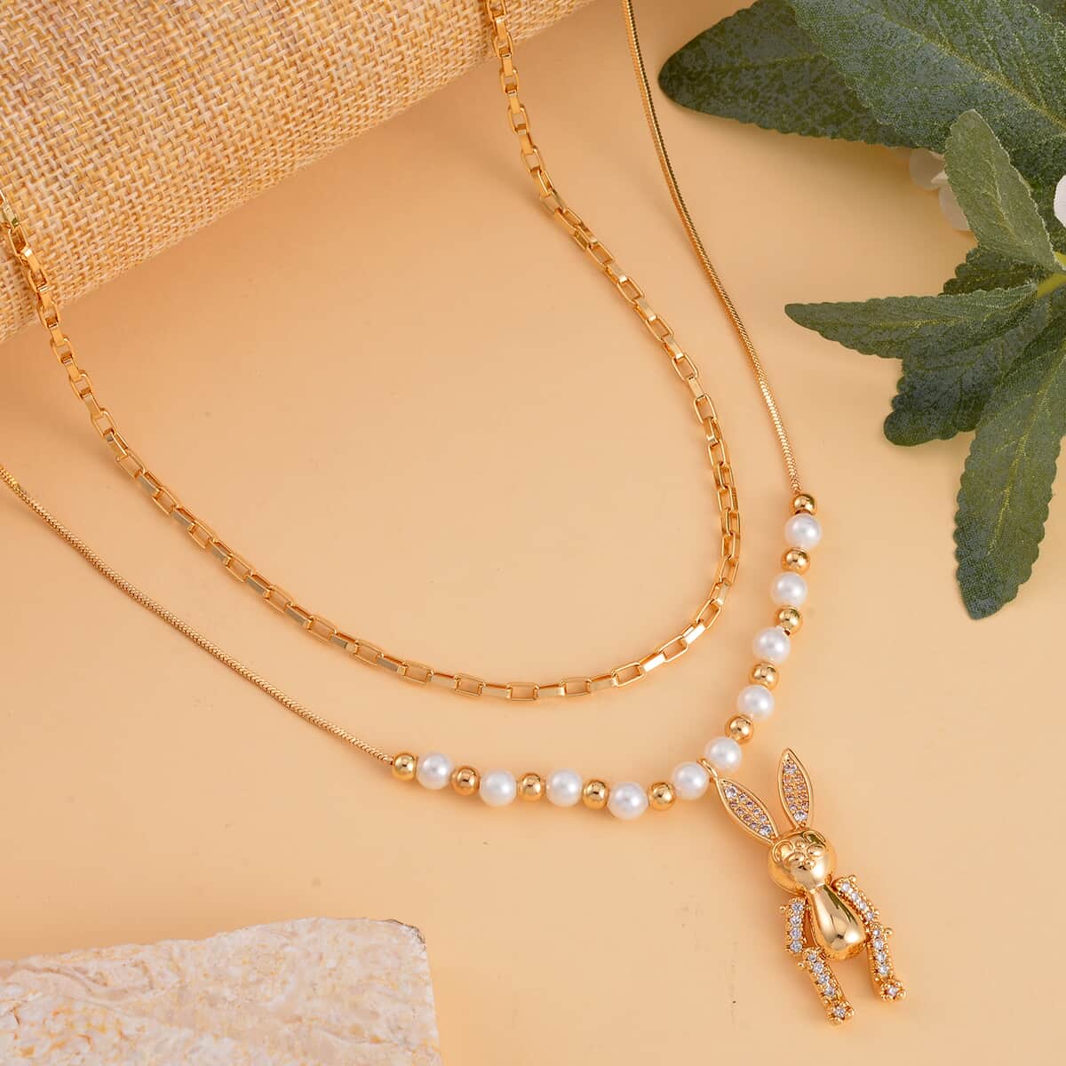 White Shell Pearl and Austrian Crystal Rabbit Necklace 20-22 Inches in Goldtone image number 1