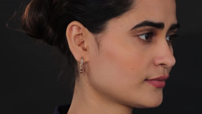 Diamond Twisted Hoop Earrings in Sterling Silver