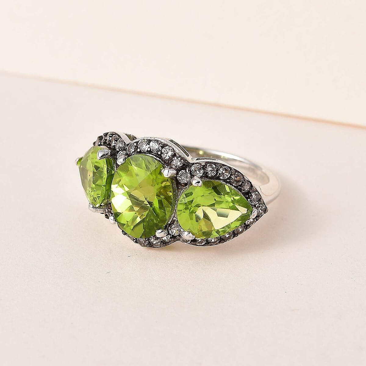 Premium Peridot, Champagne Zircon Trilogy Ring in Rhodium Over Sterling Silver (Size 11.0) 6.35 ctw image number 1