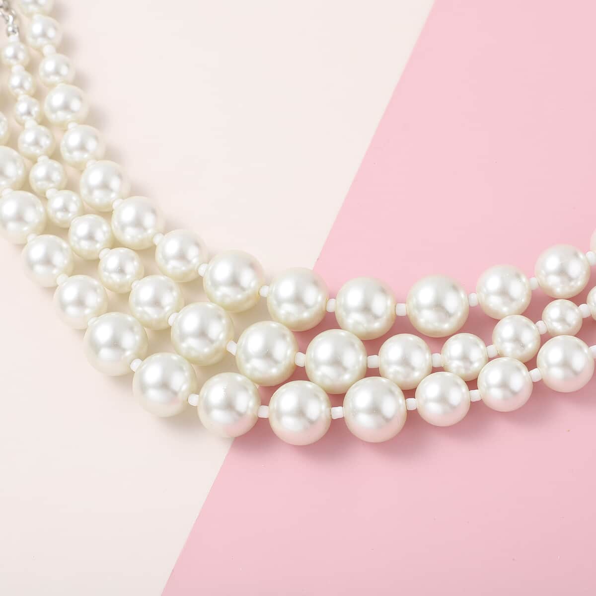 Simulated White Pearl Triple Row Necklace 20-22 Inches in Silvertone image number 1