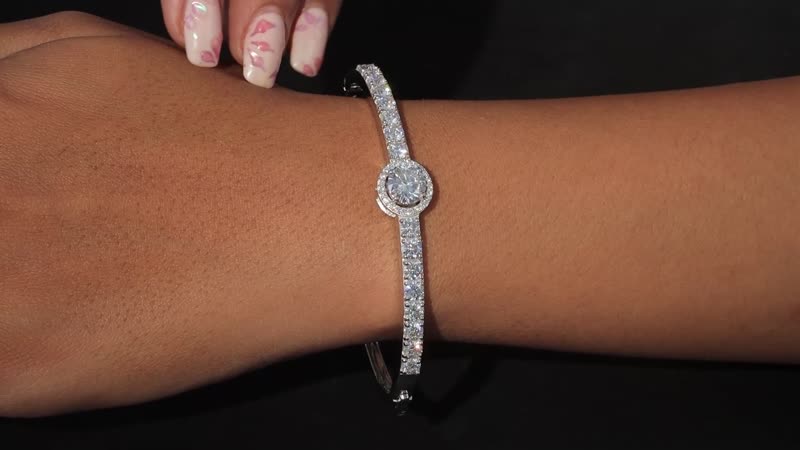Moissanite Bangle Bracelet in Platinum Over Sterling Silver (7.25 In) 5.65 ctw