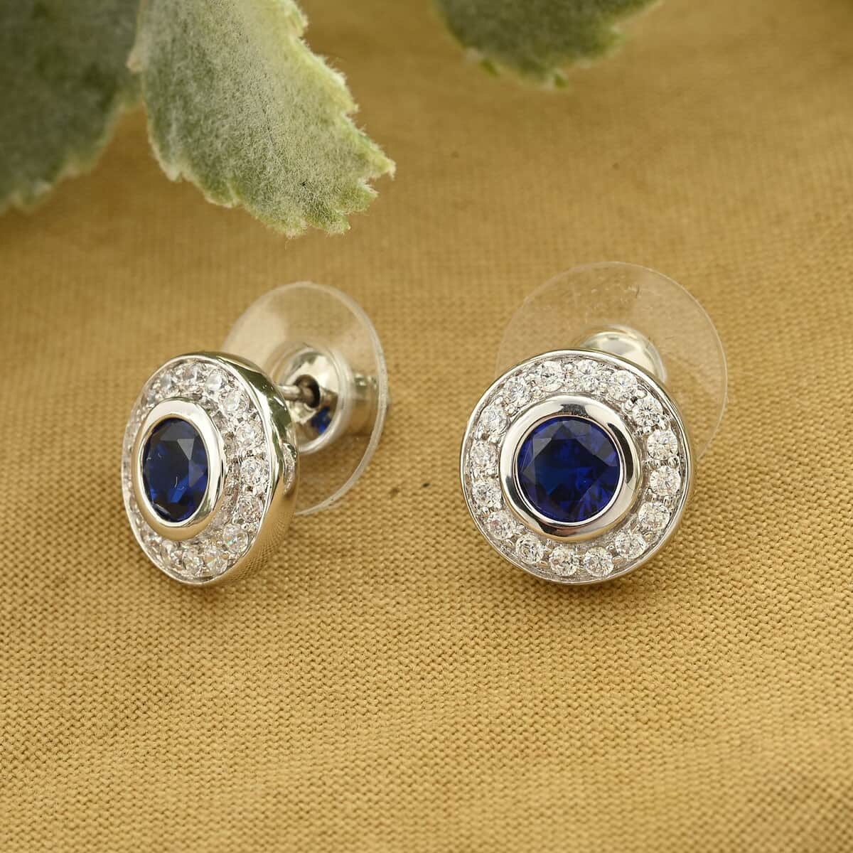 Simulated Blue and White Diamond Earrings in Silvertone 2.10 ctw image number 1