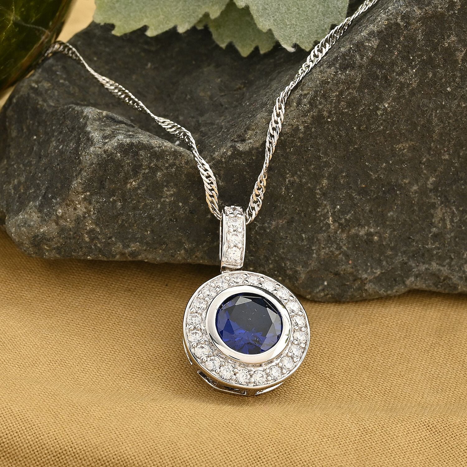 Simulated Blue and White Diamond Pendant in Silvertone 2.00 ctw