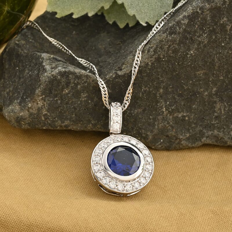 Simulated Blue and White Diamond Pendant in Silvertone 2.00 ctw