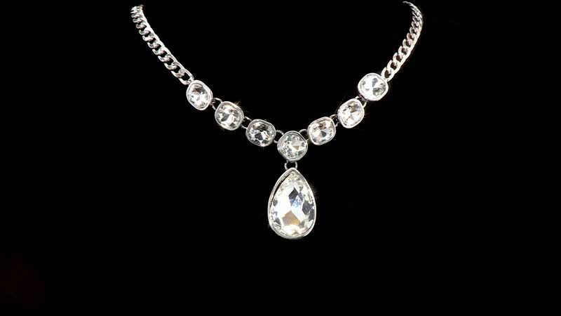Simulated White Magic Color Quartz Drop Necklace (19.5-21.5Inches) in Silvertone
