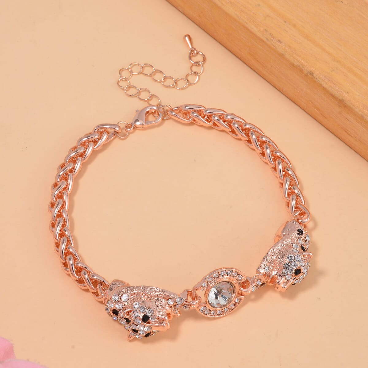 Black and White Austrian Crystal and Enameled Tiger Bracelet in Rosetone (7.50-9.50In) image number 1