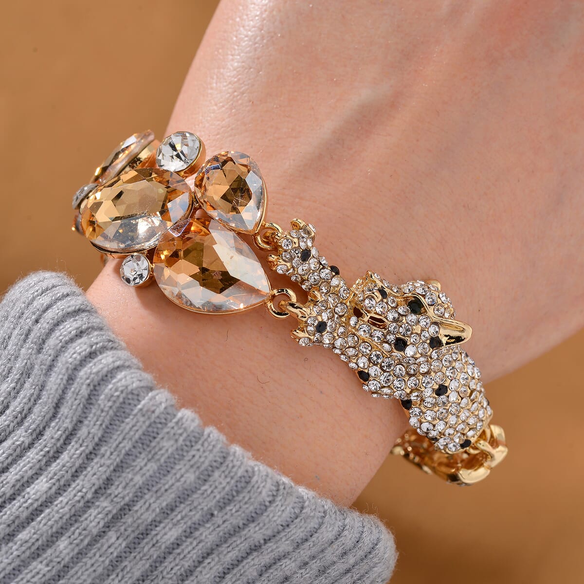 Simulated Champagne Quartz and Austrian Crystal Panther Bracelet in Goldtone (7.50 In) image number 1