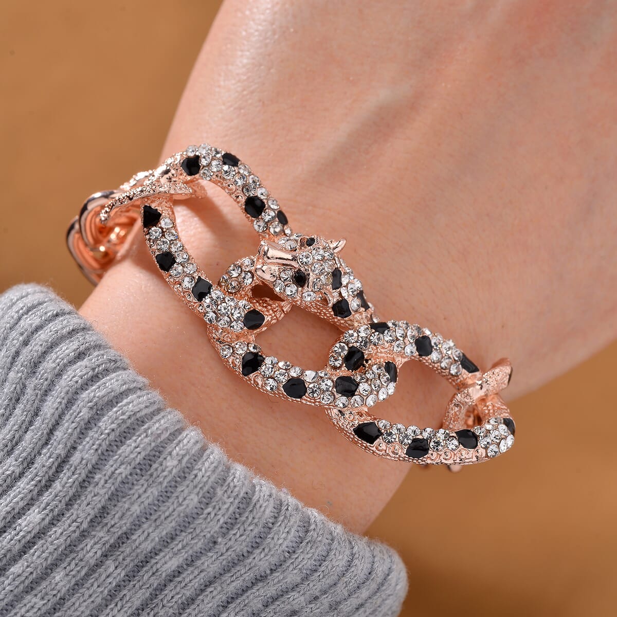Value Buy Black and White Austrian Crystal and Enameled Cuban Link Chain Panther Bracelet in Rosetone (8.0-10In) image number 1