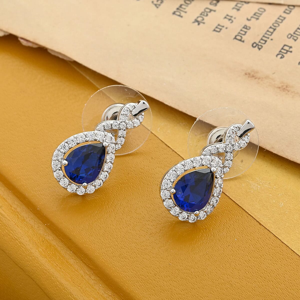 Lab Created Blue Spinel and Simulated Diamond Earrings in Silvertone 3.50 ctw image number 1