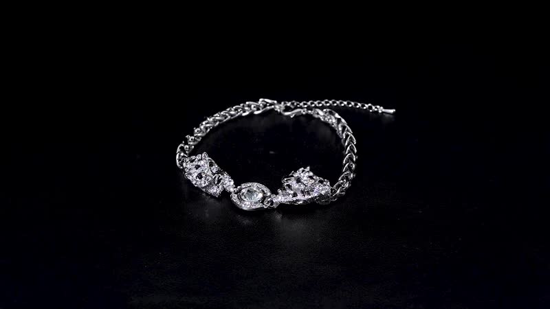 Black and White Austrian Crystal and Enameled Tiger Bracelet in Silvertone (8.0-10In)