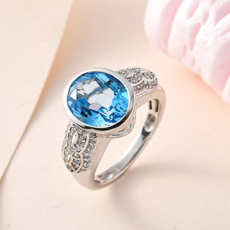 Electric Blue Topaz and White Zircon 5.51 ctw Ring in Platinum Over Sterling Silver (Size 9.0)