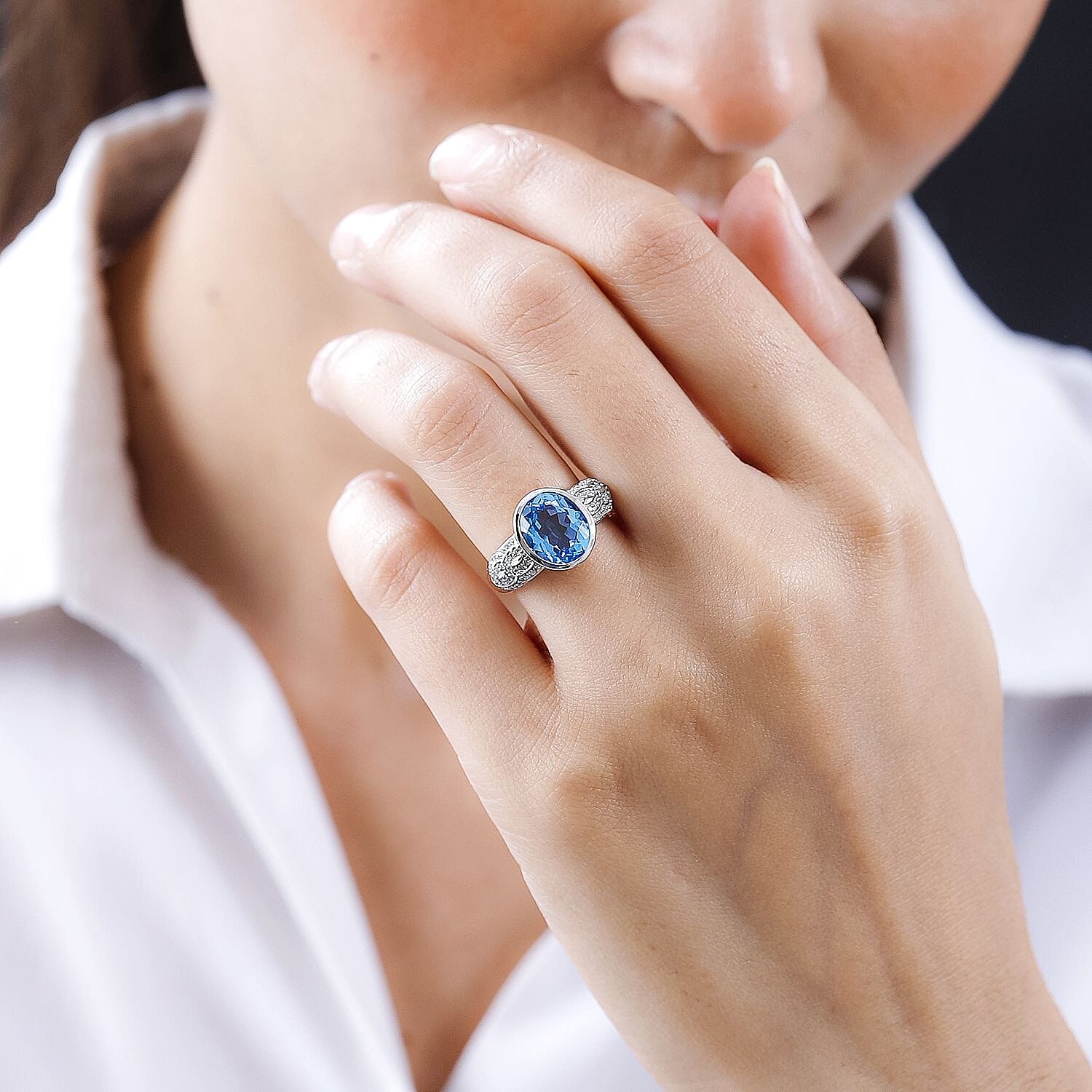 Electric Blue Topaz and White Zircon 5.51 ctw Ring in Platinum Over Sterling Silver (Size 9.0)