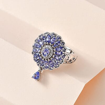 Tanzanite and White Zircon Floral Ring in Platinum Over Sterling Silver (Size 10.0) 2.10 ctw