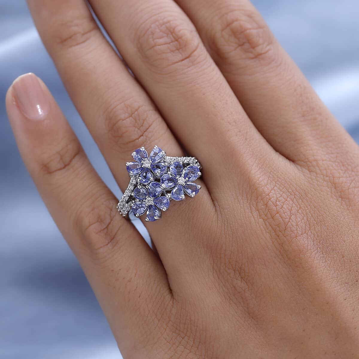 Tanzanite and White Zircon Floral Ring in Platinum Over Sterling Silver (Size 9.0) 2.35 ctw image number 2