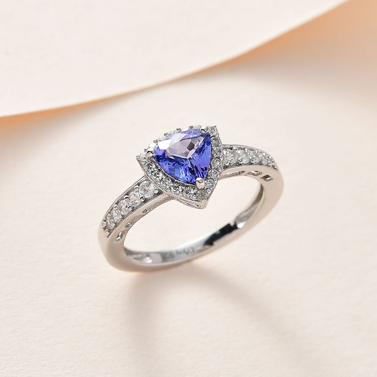 Tanzanite and White Zircon Halo Ring in Platinum Over Sterling Silver 1.00 ctw image number 1