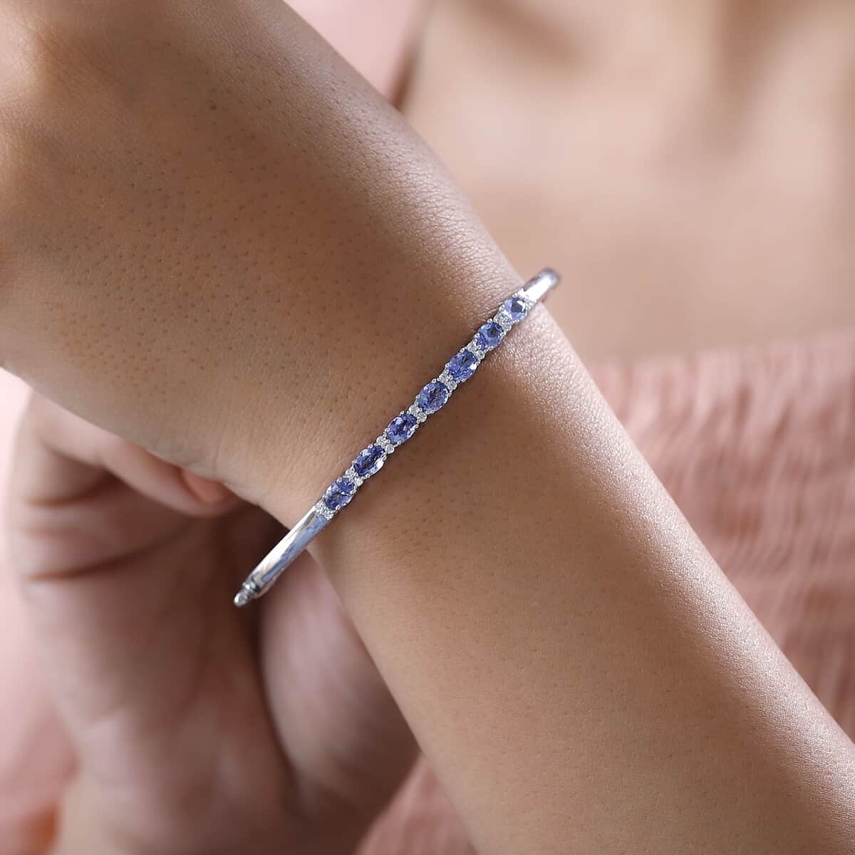 Tanzanite and White Zircon Bangle Bracelet in Platinum Over Sterling Silver (7.25 in) 2.50 ctw image number 2