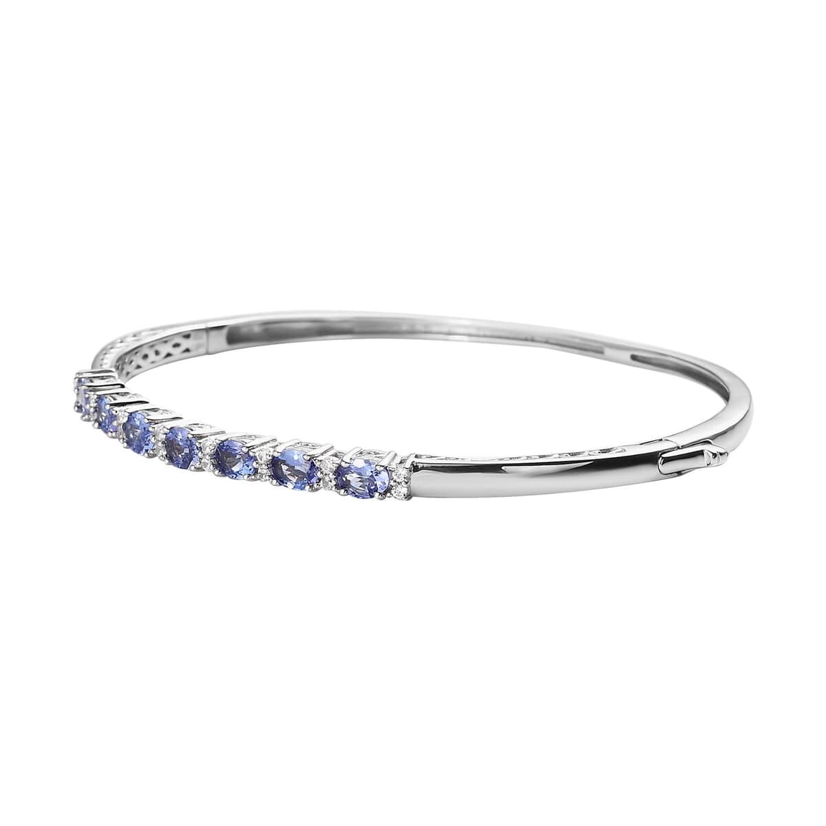 Tanzanite and White Zircon Bangle Bracelet in Platinum Over Sterling Silver (7.25 in) 2.50 ctw image number 3