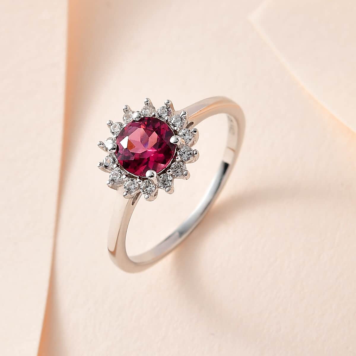 Tanzanian Rhodolite Garnet and White Zircon Sunburst Ring in Platinum Over Sterling Silver 1.40 ctw image number 1