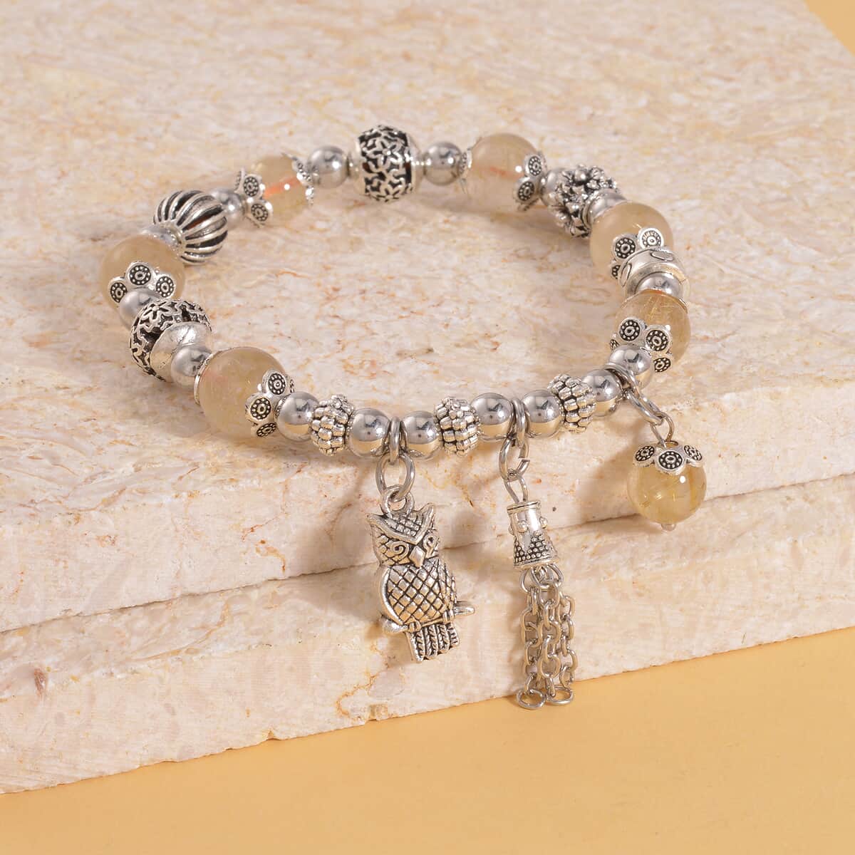 Golden Rutilated Quartz Beaded Stretch Bracelet with Silvertone Charm 47.10 ctw image number 1