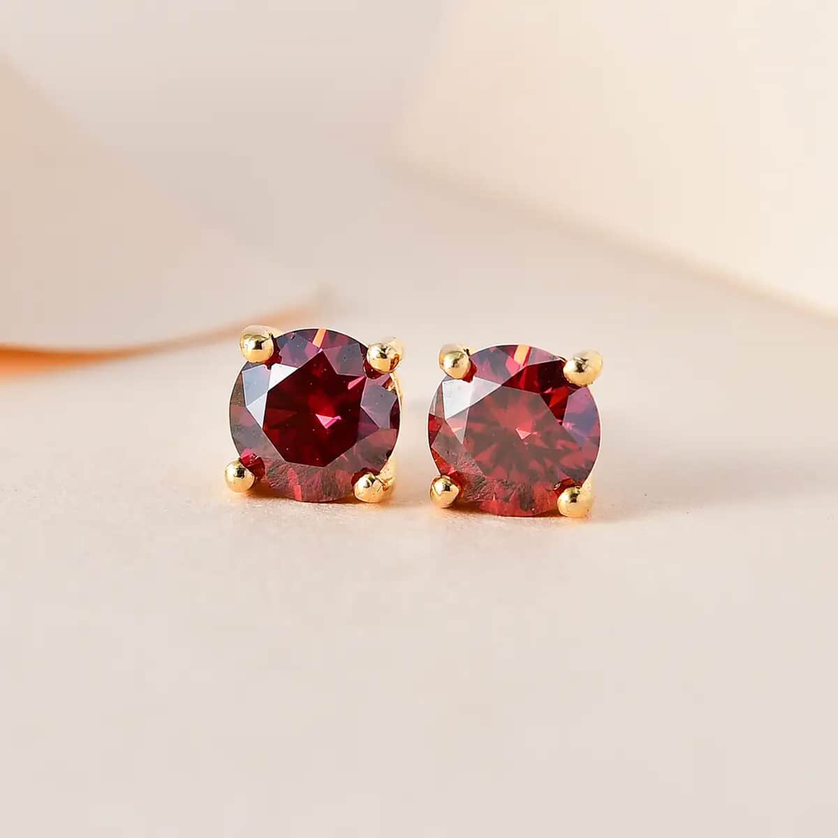 Luxury Red Moissanite Stud Earrings in Vermeil Yellow Gold Over Sterling Silver 1.90 ctw image number 1