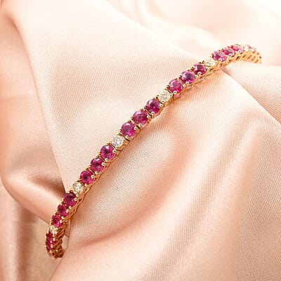NY Closeout 14K Yellow Gold Montepuez Ruby and Natural Diamond SI2-SI3 Bracelet (7.25 In) 8.80 Grams Including Titanium Spring Weight 0.55 g 3.92 ctw