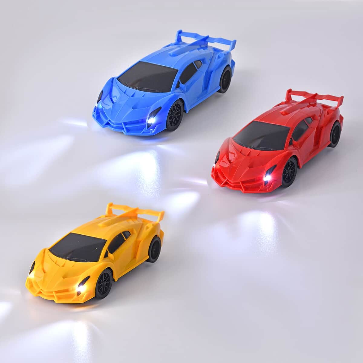3pcs Red, Yellow and Blue 4 Channels Toy Car with LED Light (3xAA for Car, 2xAA for Controller Not Included) image number 1