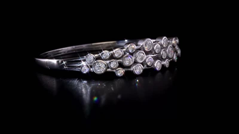Moissanite Bangle Bracelet in Platinum Over Sterling Silver (7.50 In) 5.15 ctw