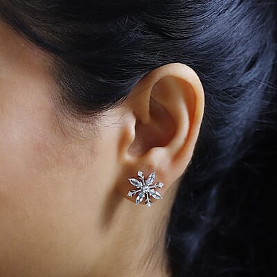 Premium Sky Blue Topaz and Moissanite Snowflake Earrings in Platinum Over Sterling Silver 1.50 ctw