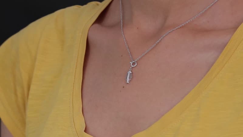 Moissanite Fish Charm in Platinum Over Sterling Silver 0.07 ctw