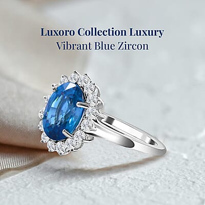 Luxoro AAA Ratanakiri Blue Zircon and Moissanite 6.30 ctw Sunburst Ring in 14K White Gold (Size 10.0)