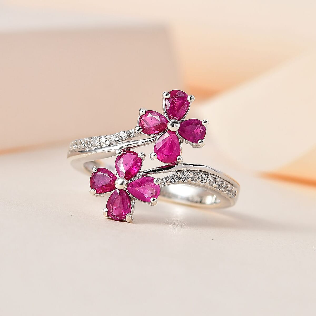 Premium Montepuez Ruby and White Zircon Bypass Floral Ring in Platinum Over Sterling Silver (Size 6.0) 1.35 ctw image number 1