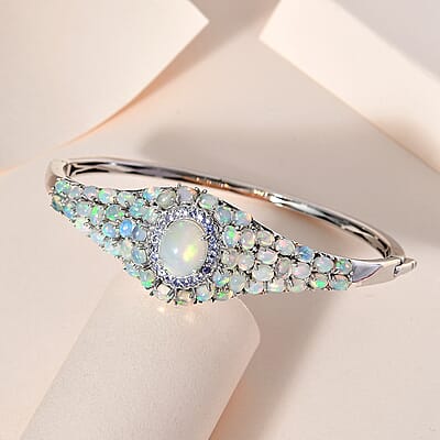 Premium Ethiopian Welo Opal and Tanzanite Bangle Bracelet in Platinum Over Sterling Silver (7.25 in) 9.00 ctw