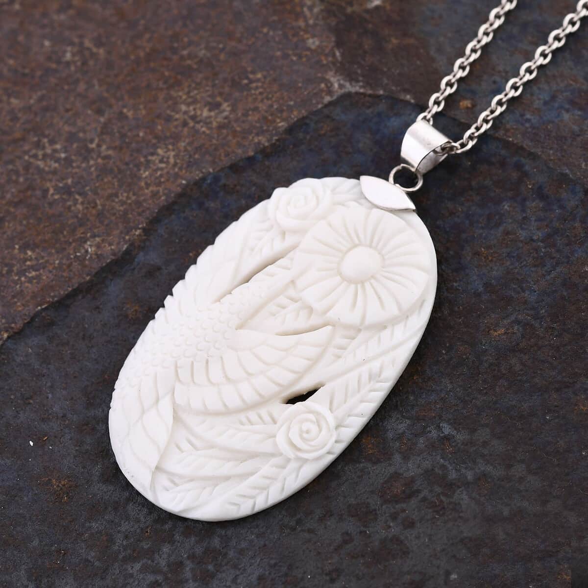 Carved Bone Flower Pendant in Sterling Silver image number 1