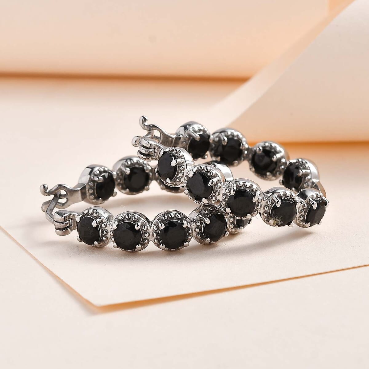 Thai Black Spinel 4.15 ctw Hoop Earrings in Stainless Steel image number 1