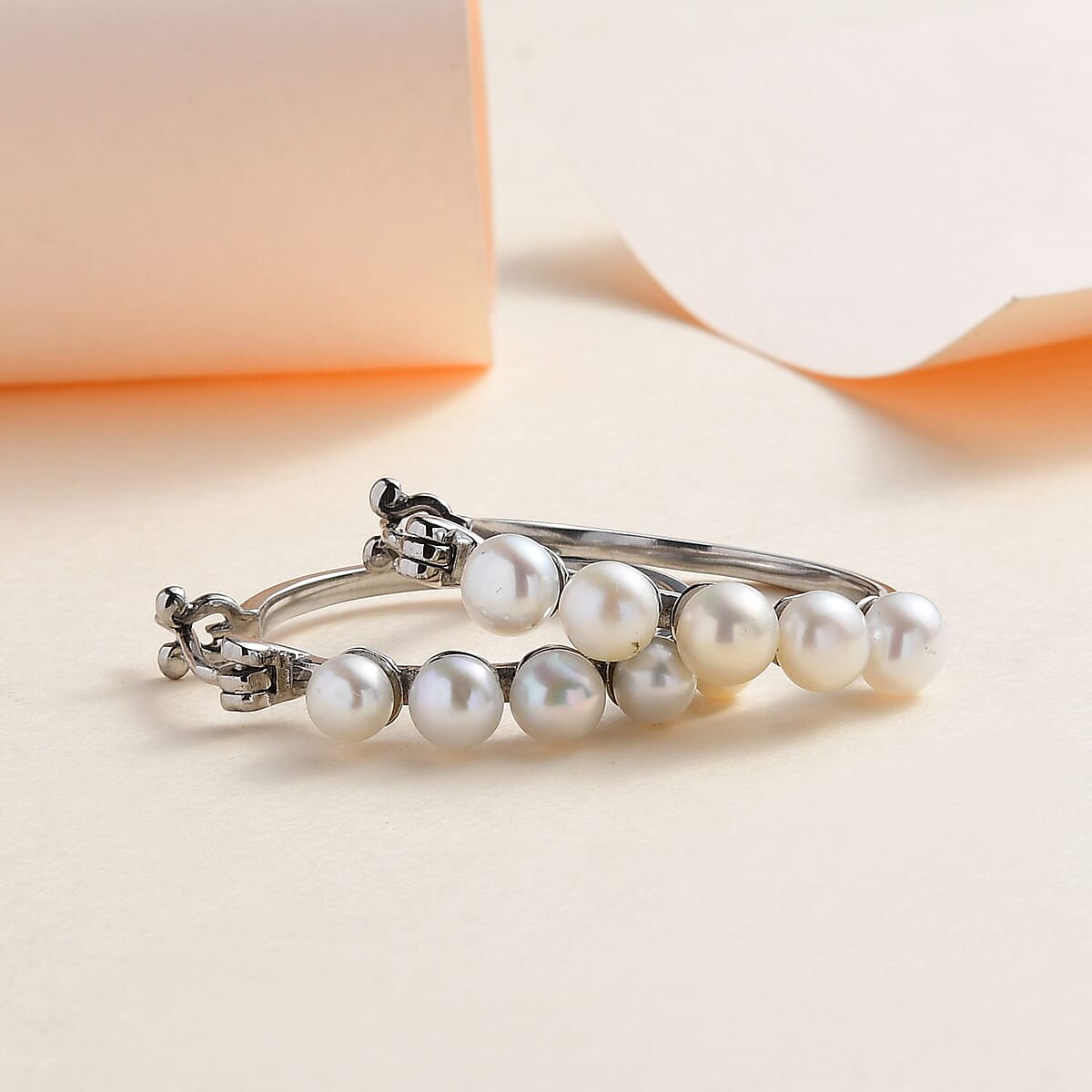 White Freshwater Pearl Hoop Earrings in Stainless Steel image number 1