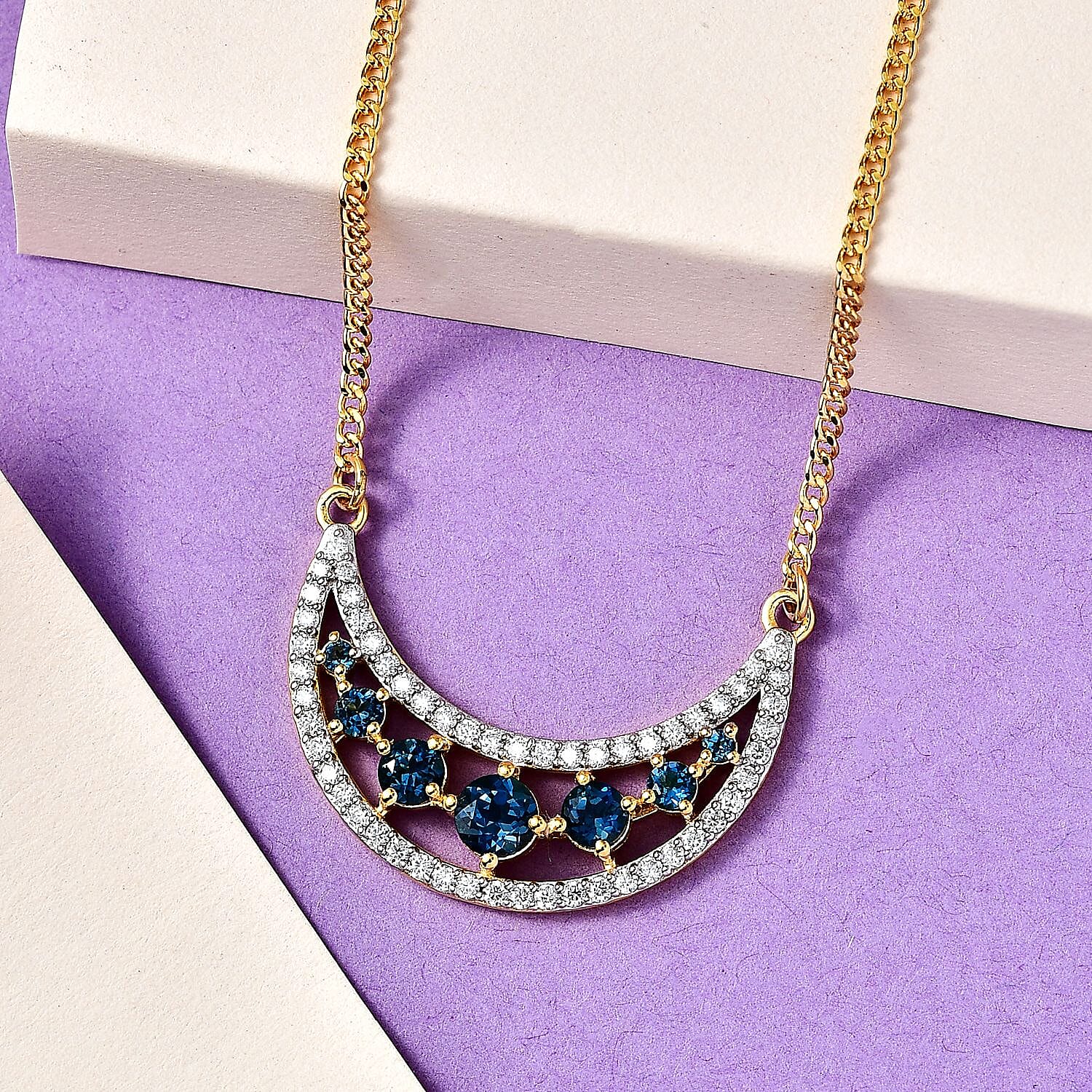 London Blue Topaz and Moissanite Celestial Crescent Moon Necklace 18 Inches in Vermeil Yellow Gold Over Sterling Silver 2.70 ctw