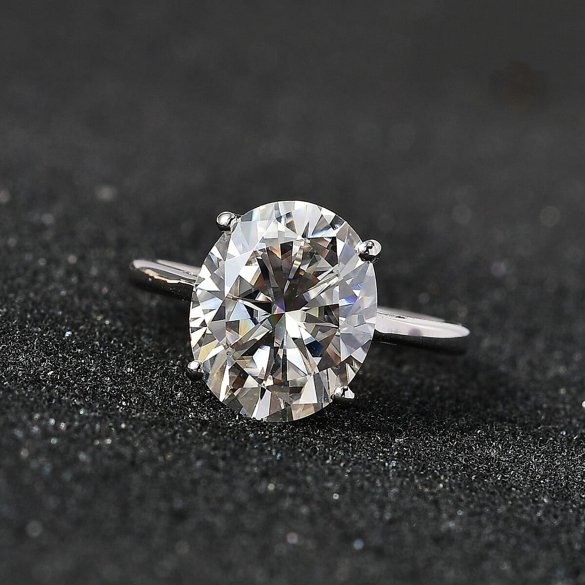Moissanite (Oval 12x10mm) Solitaire Ring in Platinum Over Sterling Silver (Size 10.0) 5.00 ctw image number 1