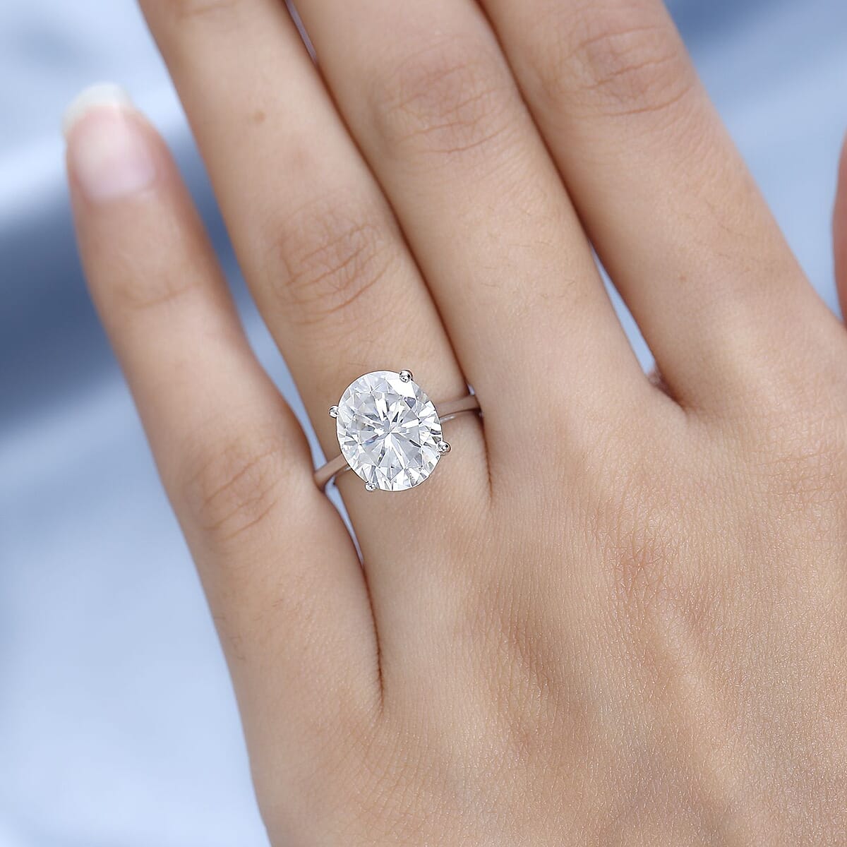 Moissanite (Oval 12x10mm) Solitaire Ring in Platinum Over Sterling Silver (Size 10.0) 5.00 ctw image number 2