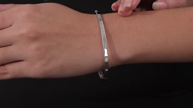 Diamond Accent Bangle Bracelet in Platinum Over Sterling Silver (7.25 In)