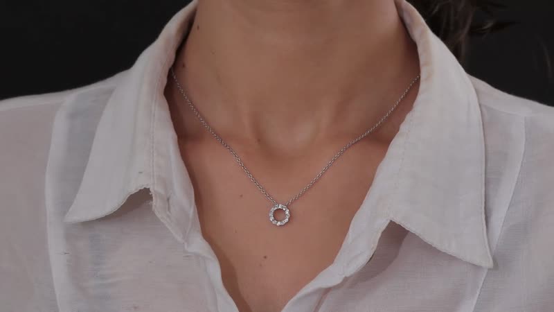 Diamond Accent Circle Pendant in Platinum Over Sterling Silver