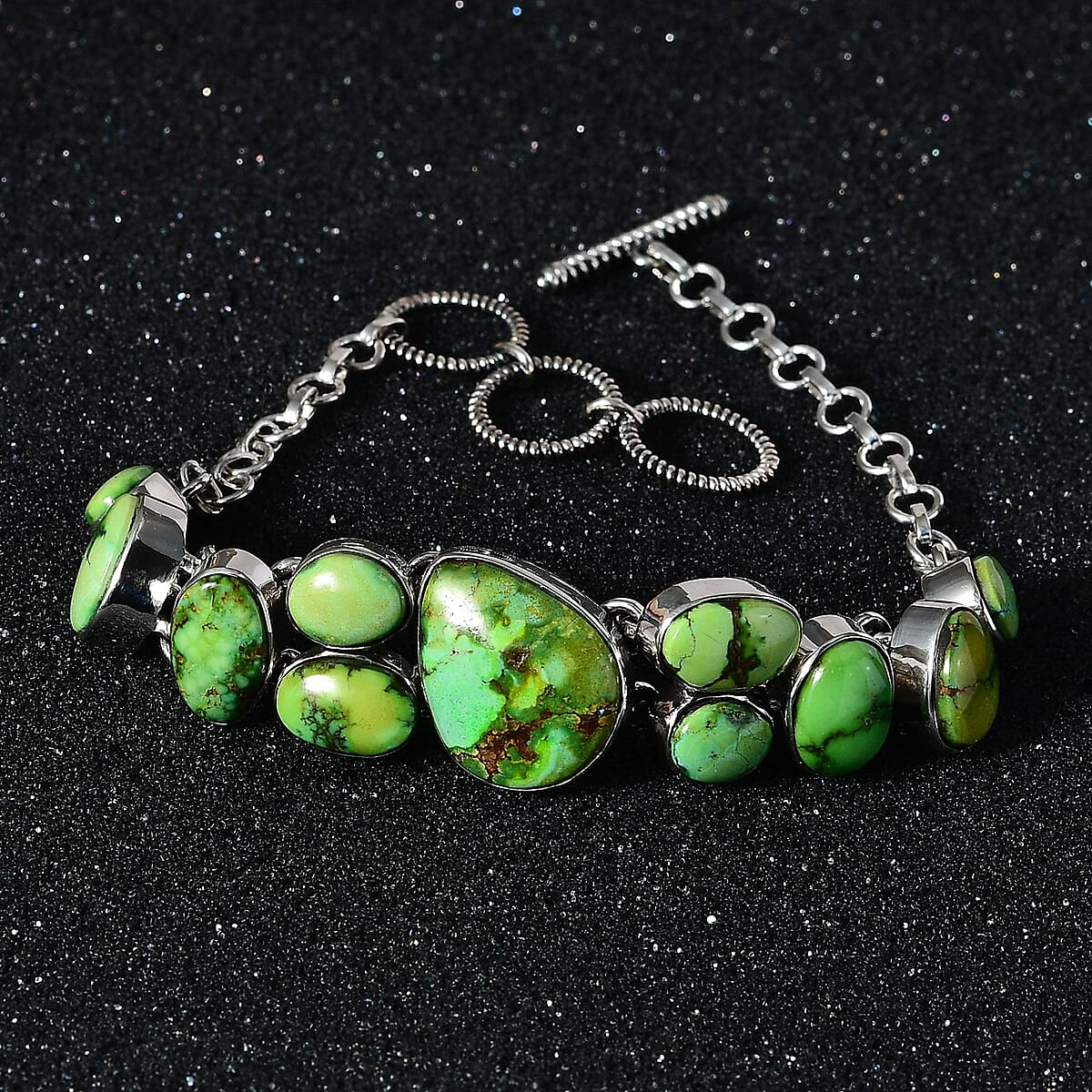 Artisan Crafted Sonoran Gold Turquoise Bracelet in Black Oxidized Sterling Silver (6.50-8.50In) 26.10 ctw image number 1