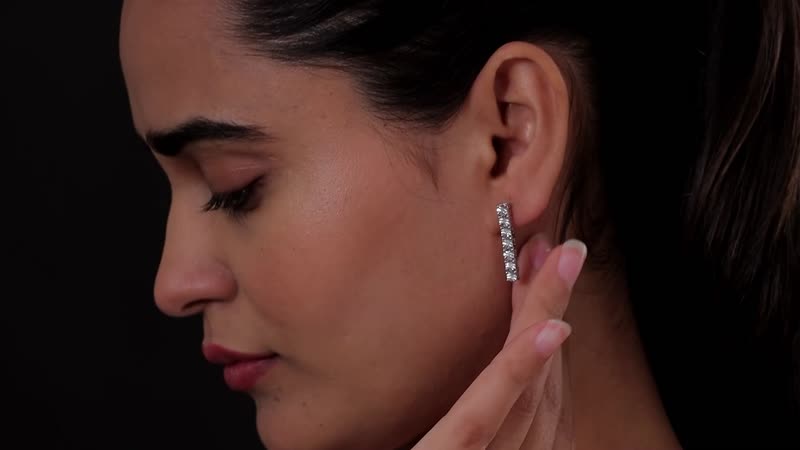 Diamond Earrings in Platinum Over Sterling Silver 0.07 ctw