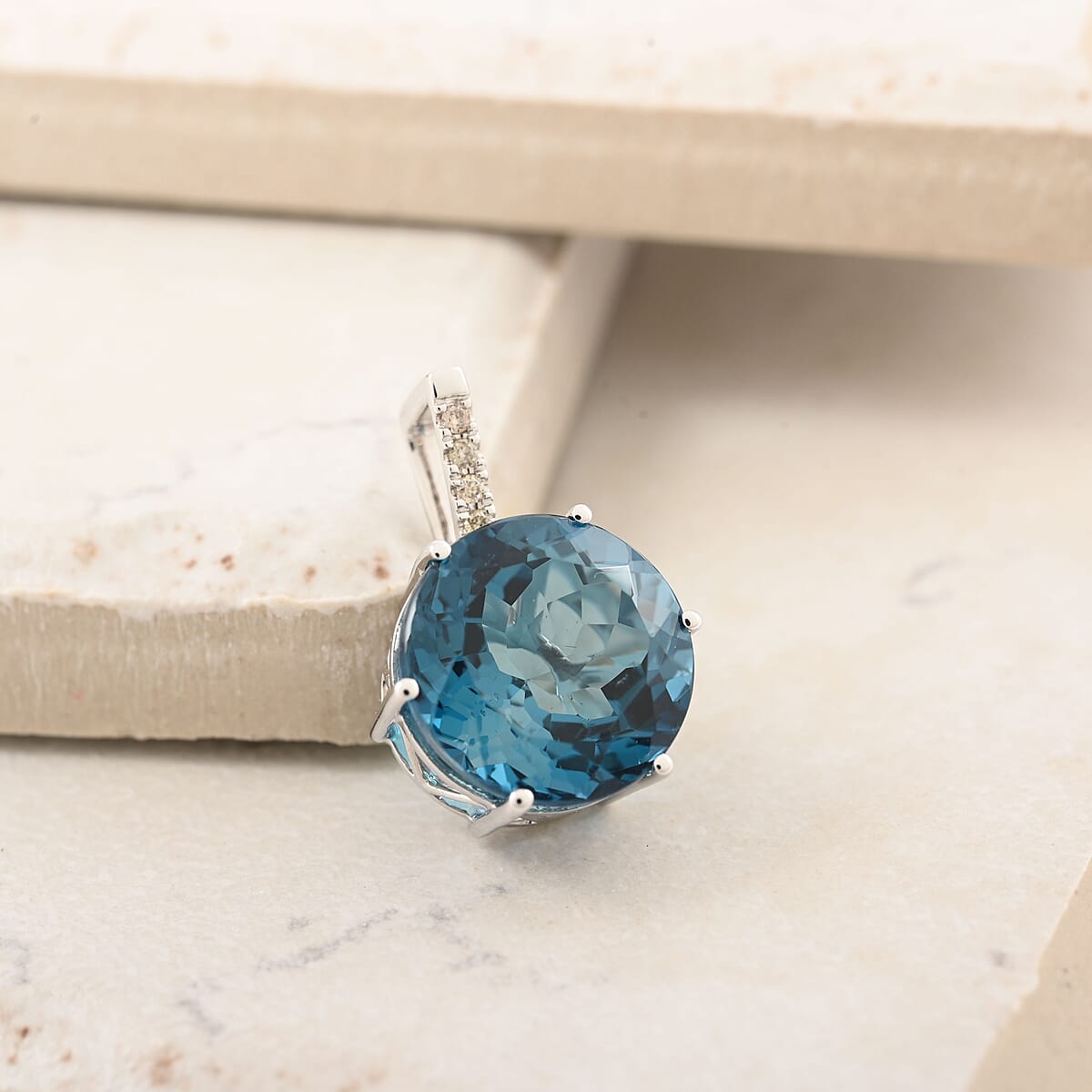 Certified and Appraised Luxoro 10K White Gold AAA London Blue Topaz and I2 Diamond Pendant 8.35 ctw image number 1