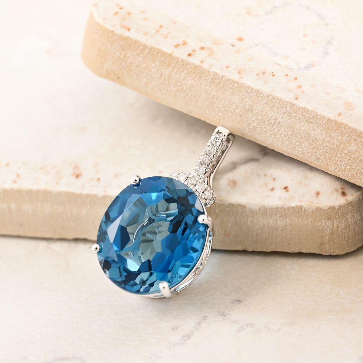 Certified and Appraised Luxoro 10K White Gold AAA London Blue Topaz and I2 Diamond Pendant 9.75 ctw image number 1
