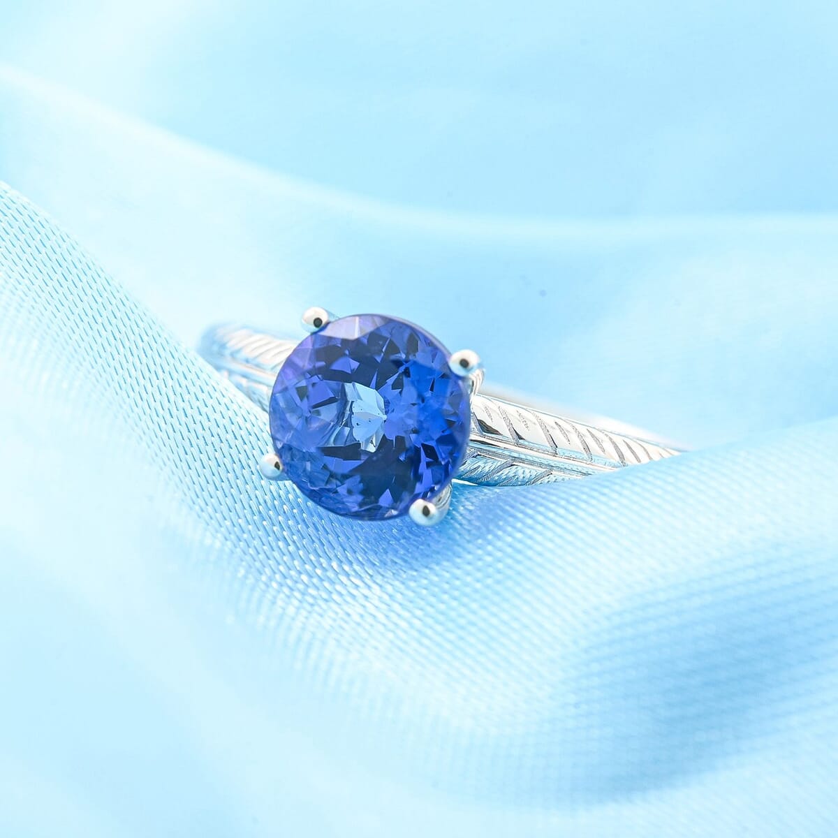 Certified & Appraised Rhapsody 950 Platinum AAAA Tanzanite Solitaire Ring (Size 9.5) 4.65 Grams 1.50 ctw image number 1